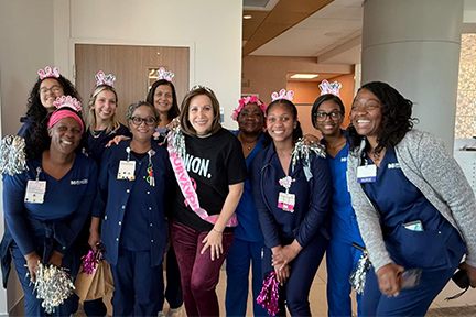 Patricia celebrating end of chemo with her breast cancer care team 