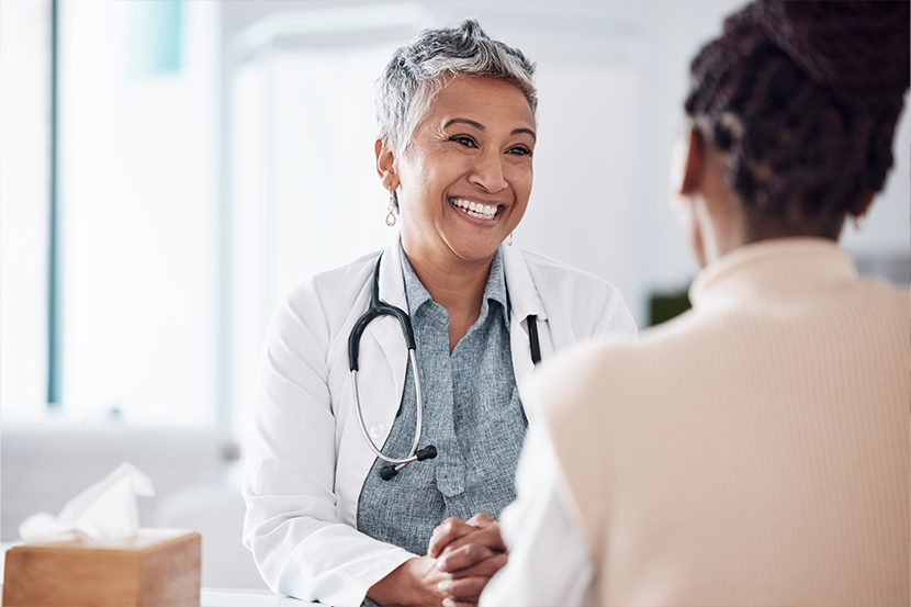 Doctor speaking with patient